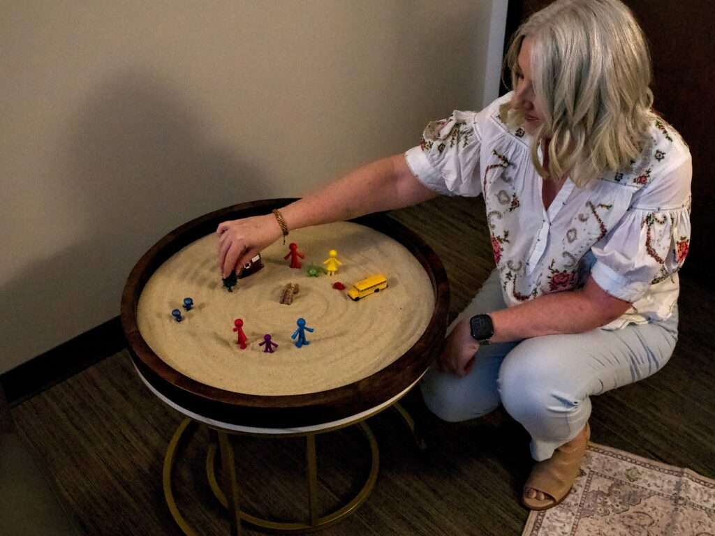 Trauma Therapist uses Sandtray to support counseling in Goodyear Arizona